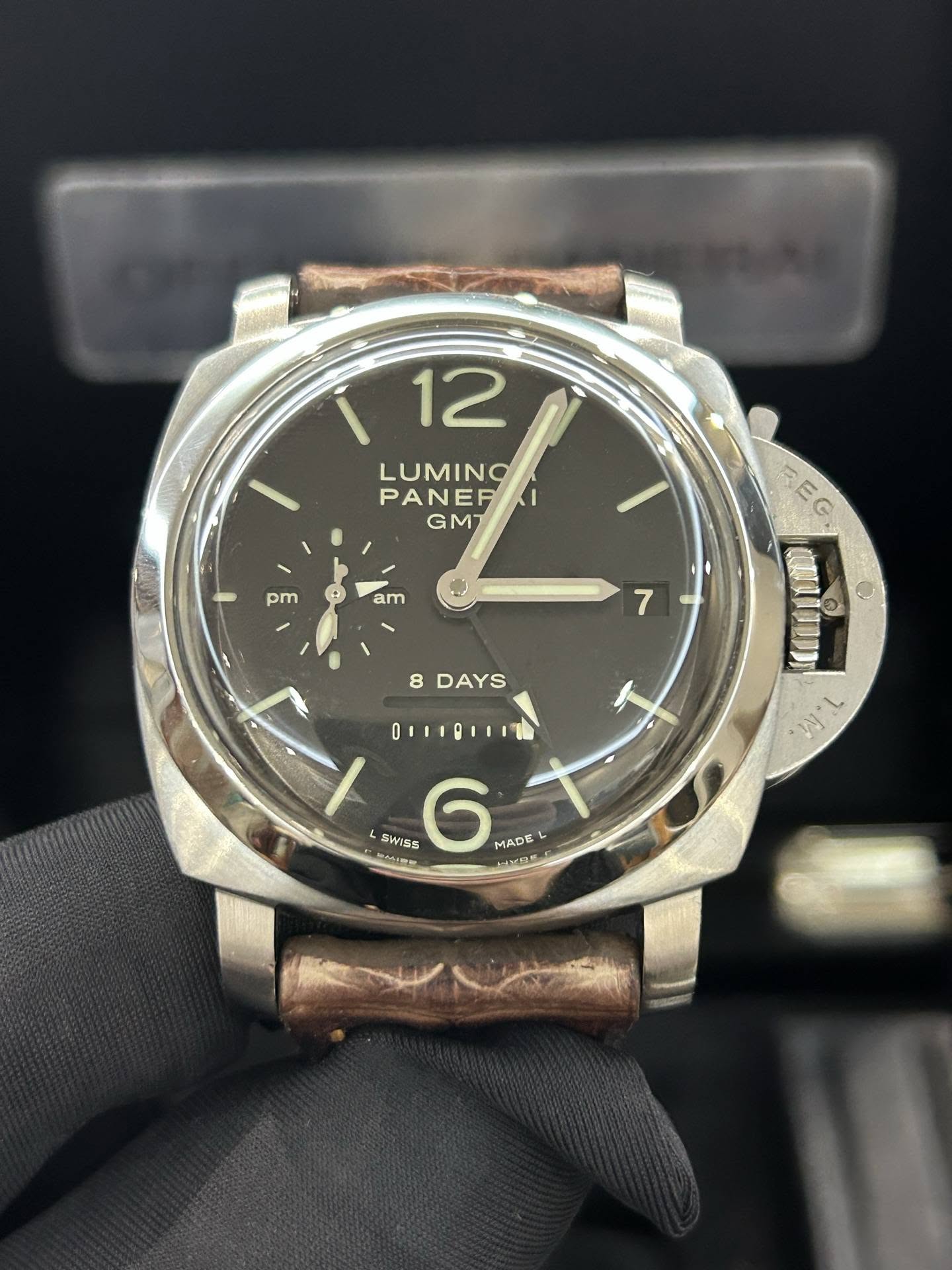 May be an image of wrist watch and text