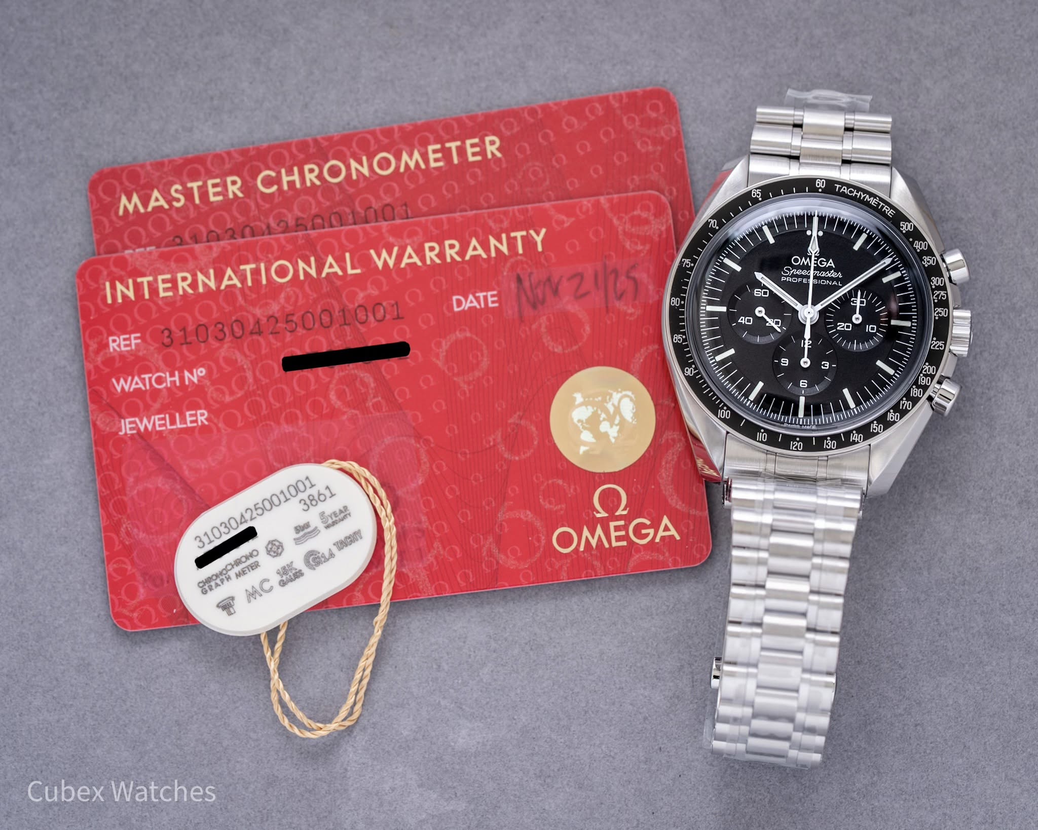 May be an image of wrist watch and text that says "អូ, ي MASTER CHRONOMETER INTERNATIONAL ുമ WARRANTY DATE NArz125 REF WATCHN° N° JEWELLER 5ា ΗγΜέη S0U 400 ភូទប OM ちものえせい EGA…