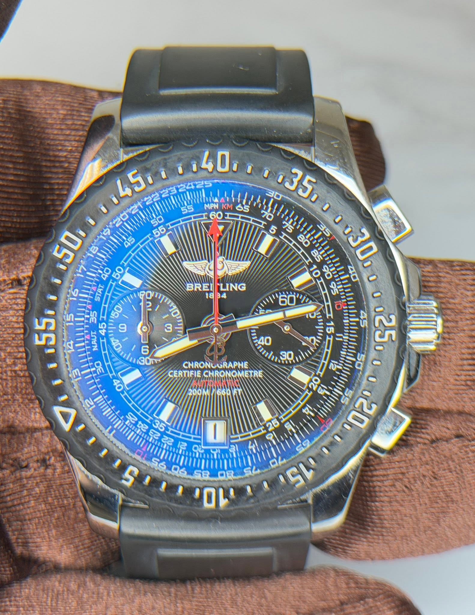 May be an image of digital watch and text that says ' , 140 55 MPH KM 65 70 50i , 50 ST 95 0 יס5י 60 물 45 ,25. Л 45 三 LO 100 50 PO BREILING BREI LING 18 3 o oV CHRONGURAPHE…