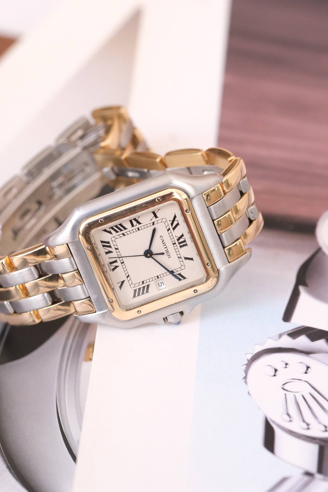 May be an image of digital watch, jewelry and text