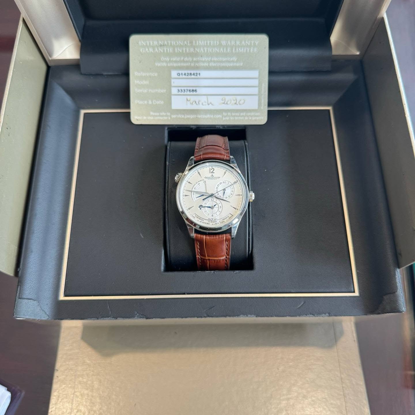 May be an image of wrist watch and text