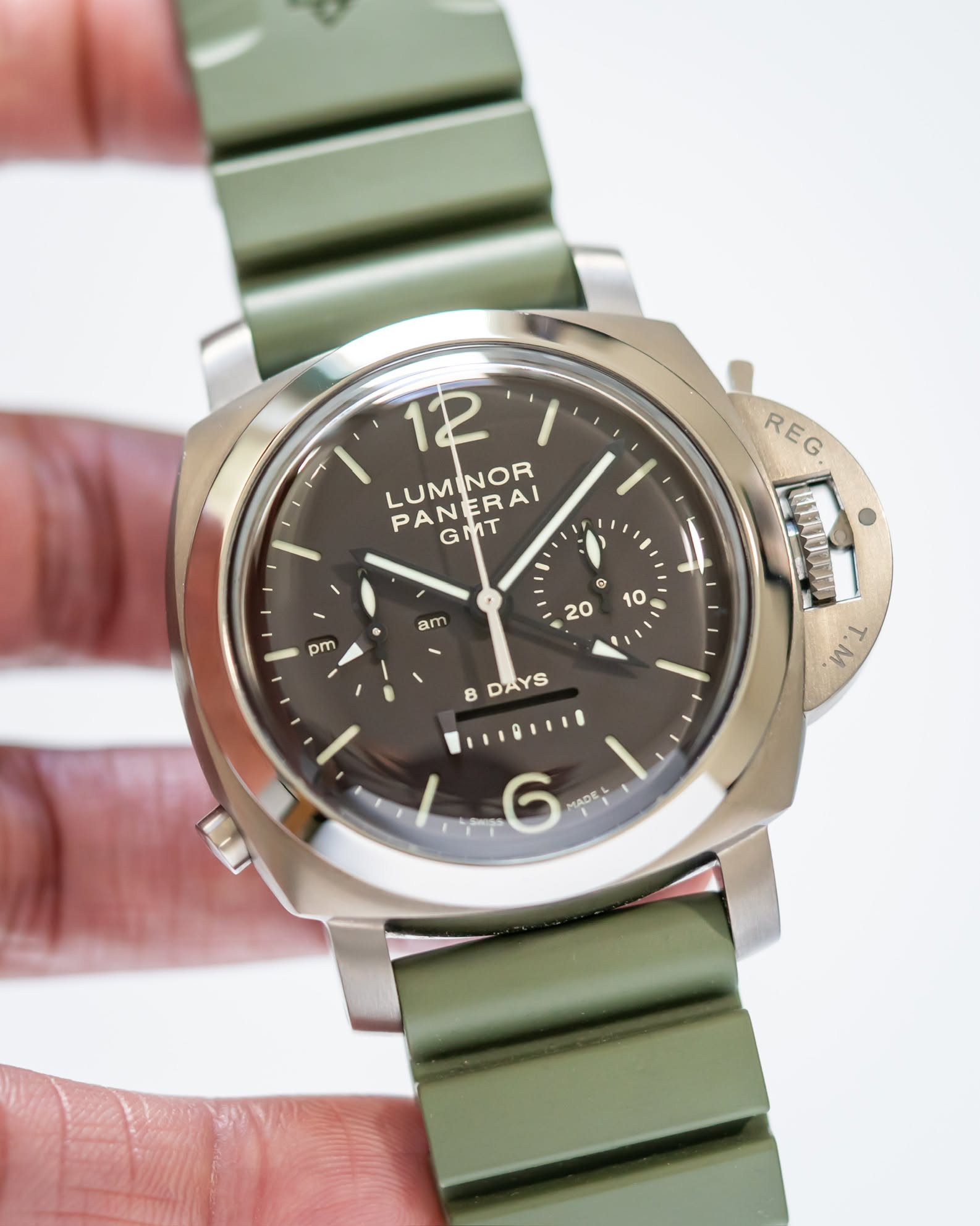May be an image of wrist watch and text
