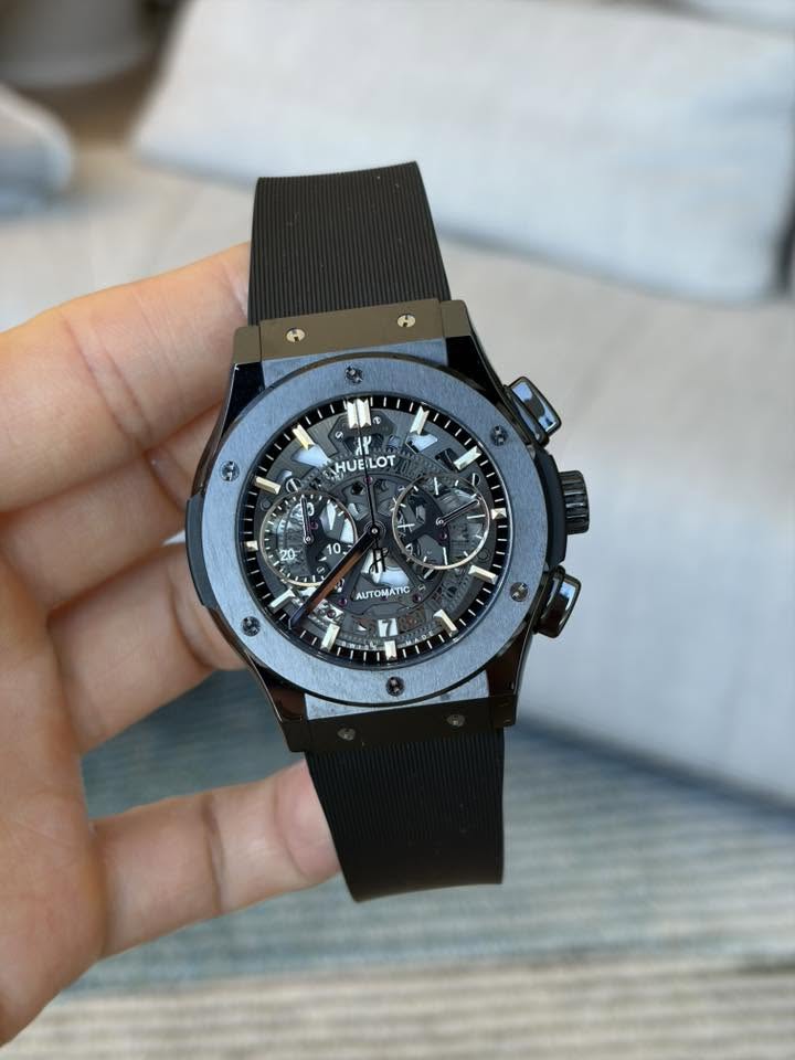 May be an image of wrist watch and text