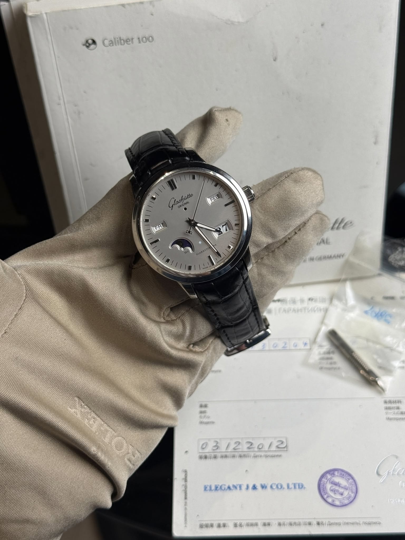 May be an image of wrist watch and text