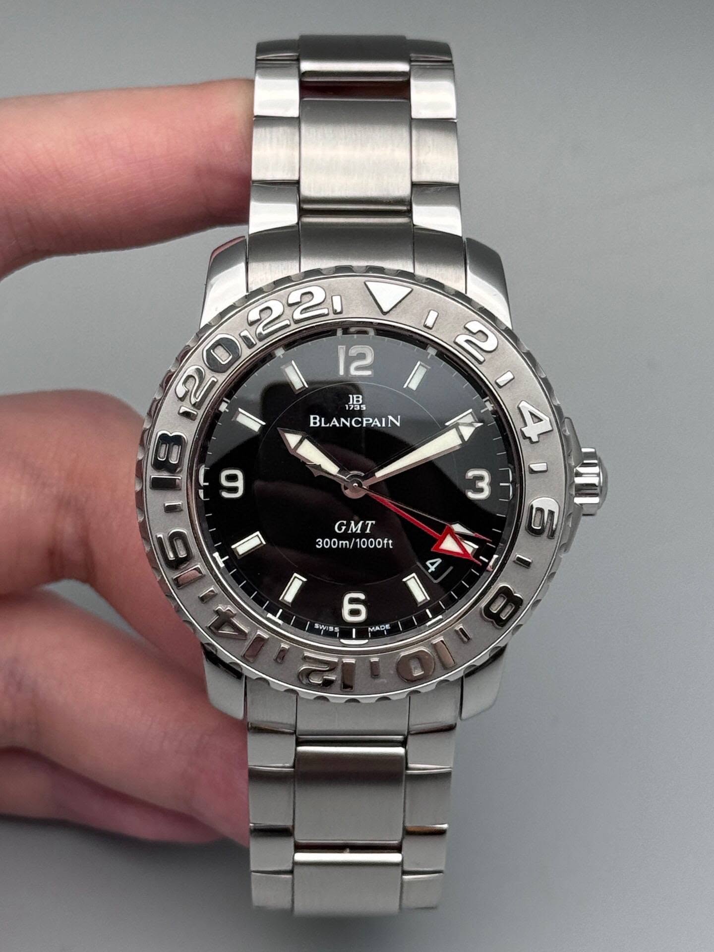 May be an image of wrist watch and text that says 't ا 晶 BLANCPAIN BLAN 0O C 9 4 ' 3 y GMT 300m/1000ft 300m /1000ft 6 1 4 r ン I 6 Swss A ADE'