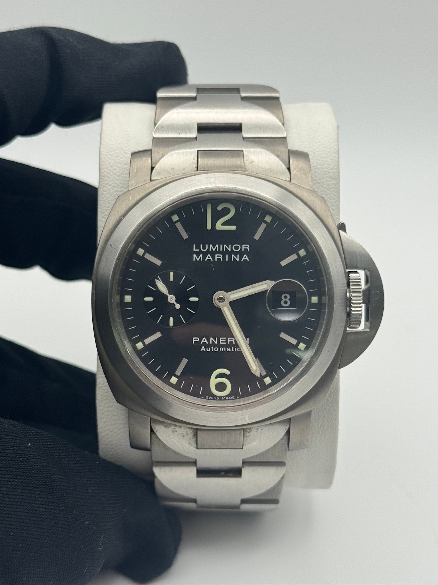 May be an image of wrist watch and text