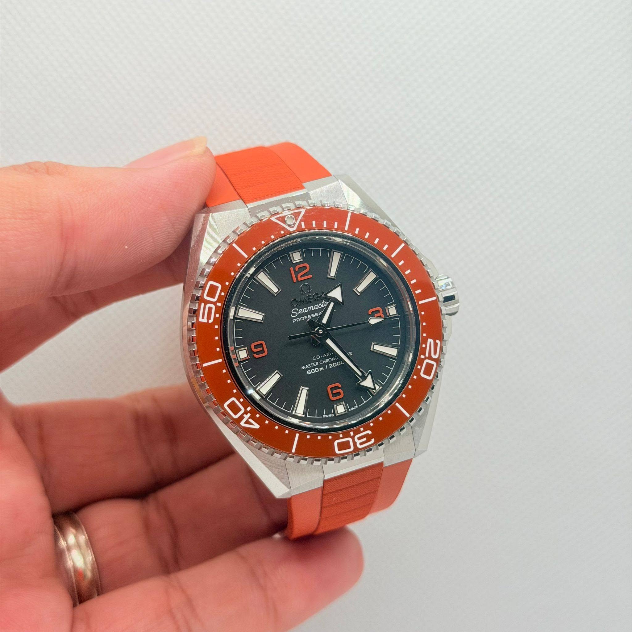 May be an image of wrist watch and text