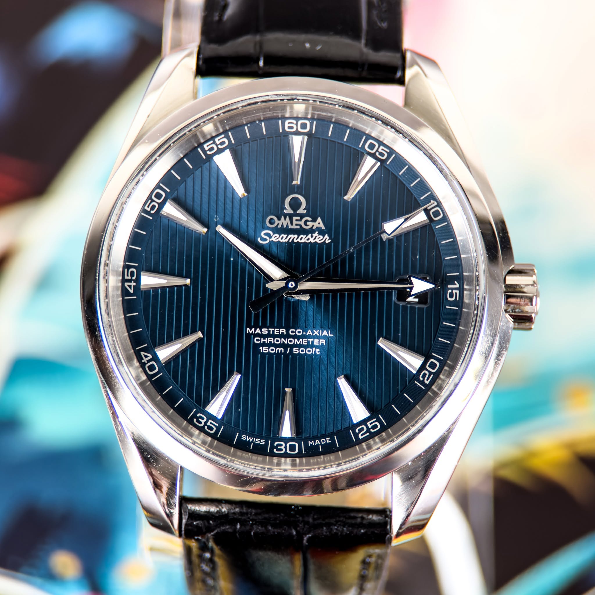 May be an image of wrist watch and text that says '1601 55/ ا 05 50 OMEGA Seamaster 10 451 আ 15 MIAL ONOME MASTER STERCO-AXIAL CO. AXIAL HRONOM OMET METER 150m 50m/600f 600ft 44…