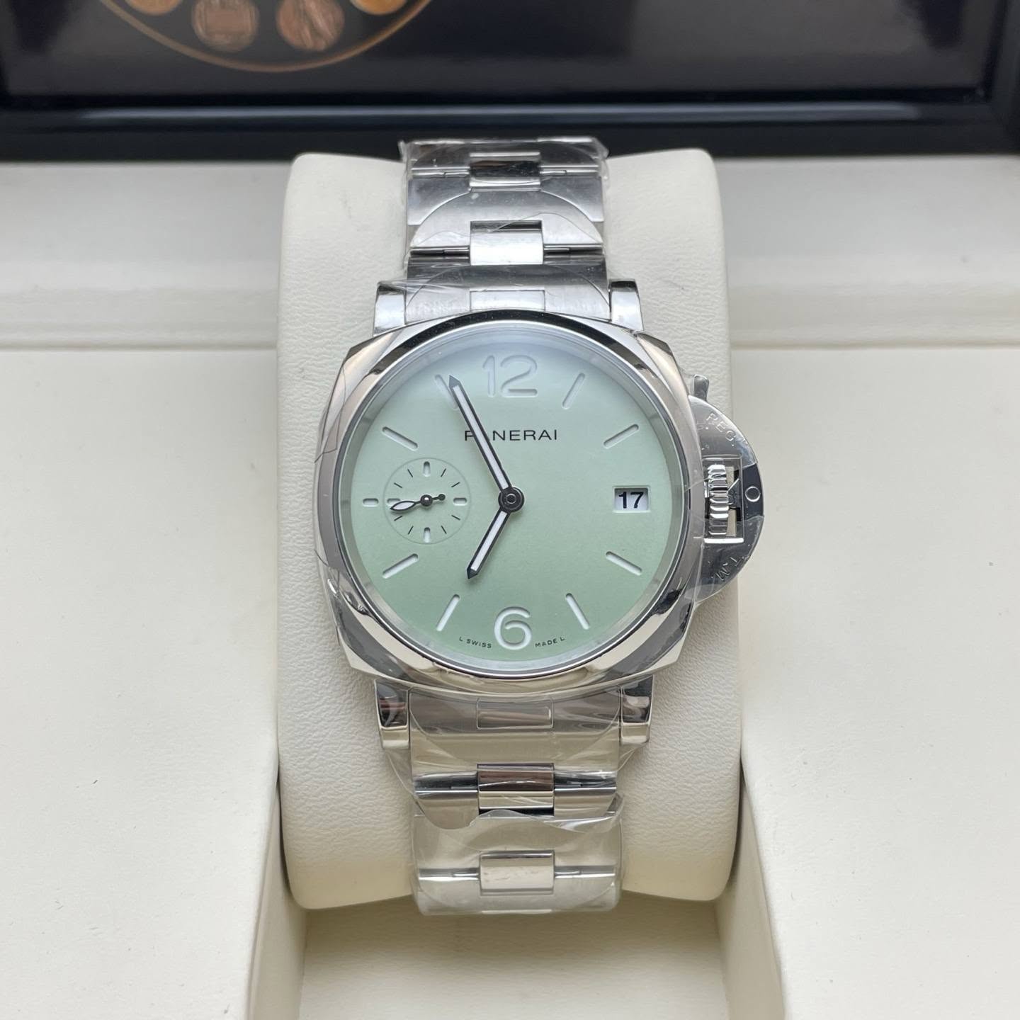 May be an image of wrist watch and text