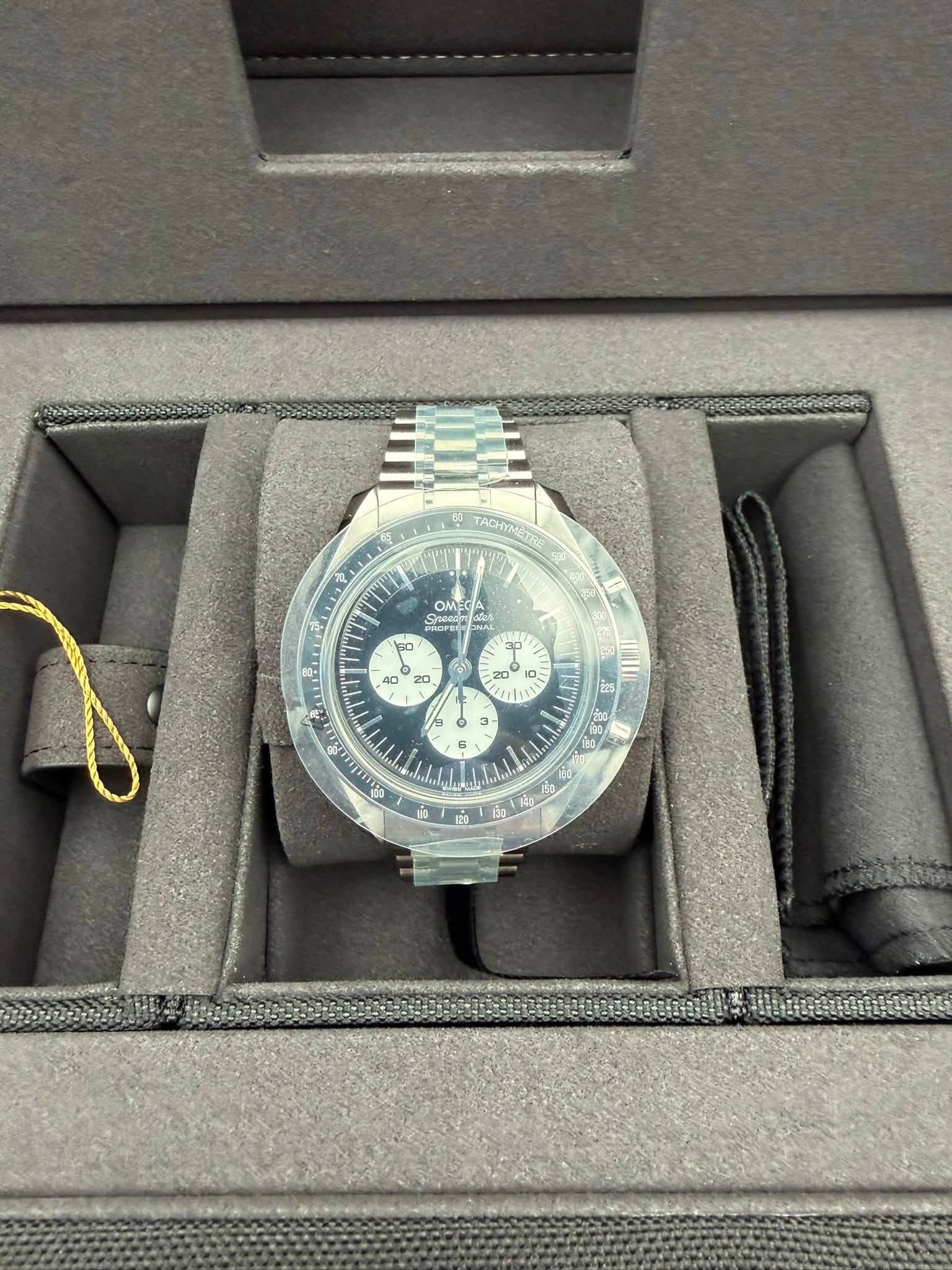 May be an image of wrist watch and text