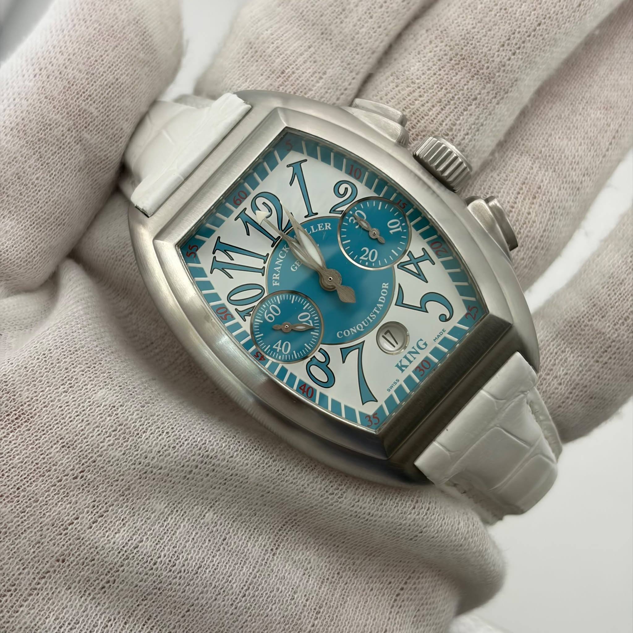 May be an image of wrist watch and text that says 'ላጋ 2 ١ : M/ LLER 1 0 FHANCE G 20 5 モ DOR 6o 11 O 40 ಕ 87 : CONQUISTADO ៣ KING 세'