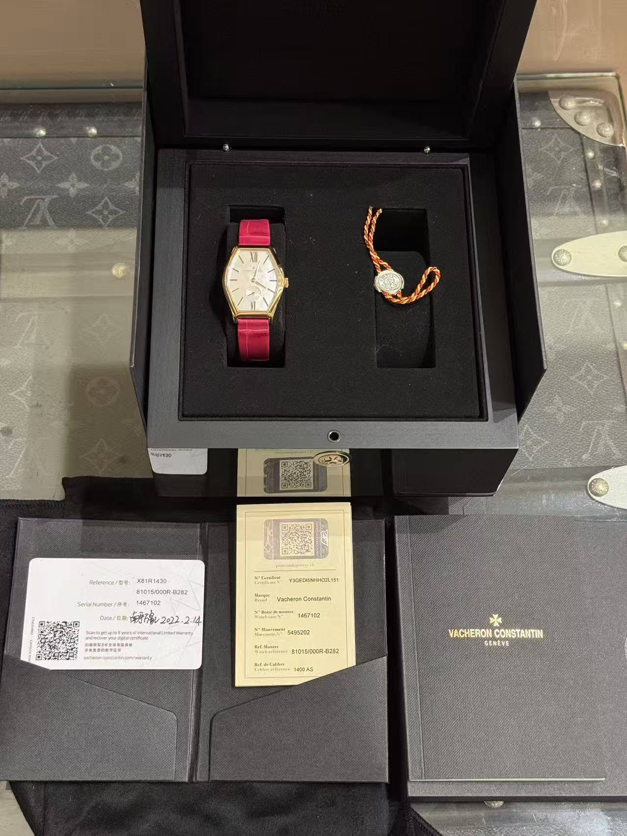 May be an image of jewelry, digital watch and text