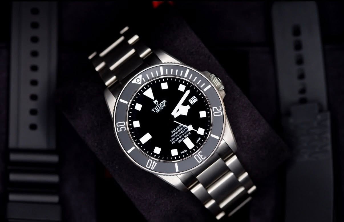 May be an image of wrist watch and text