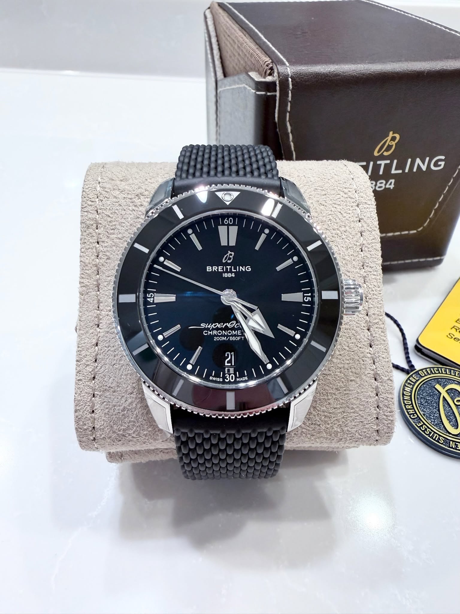 May be an image of wrist watch and text