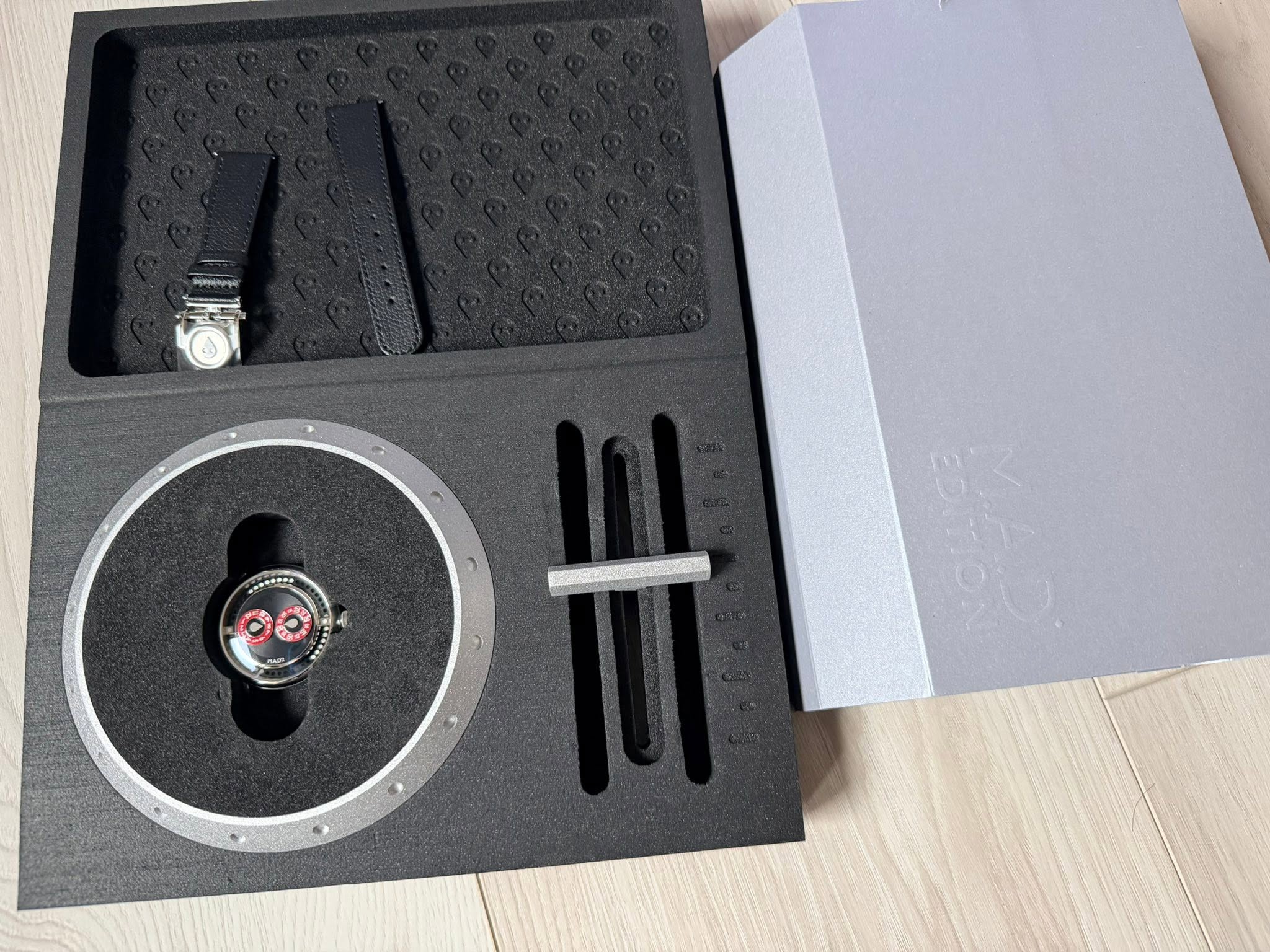 May be an image of wrist watch and text