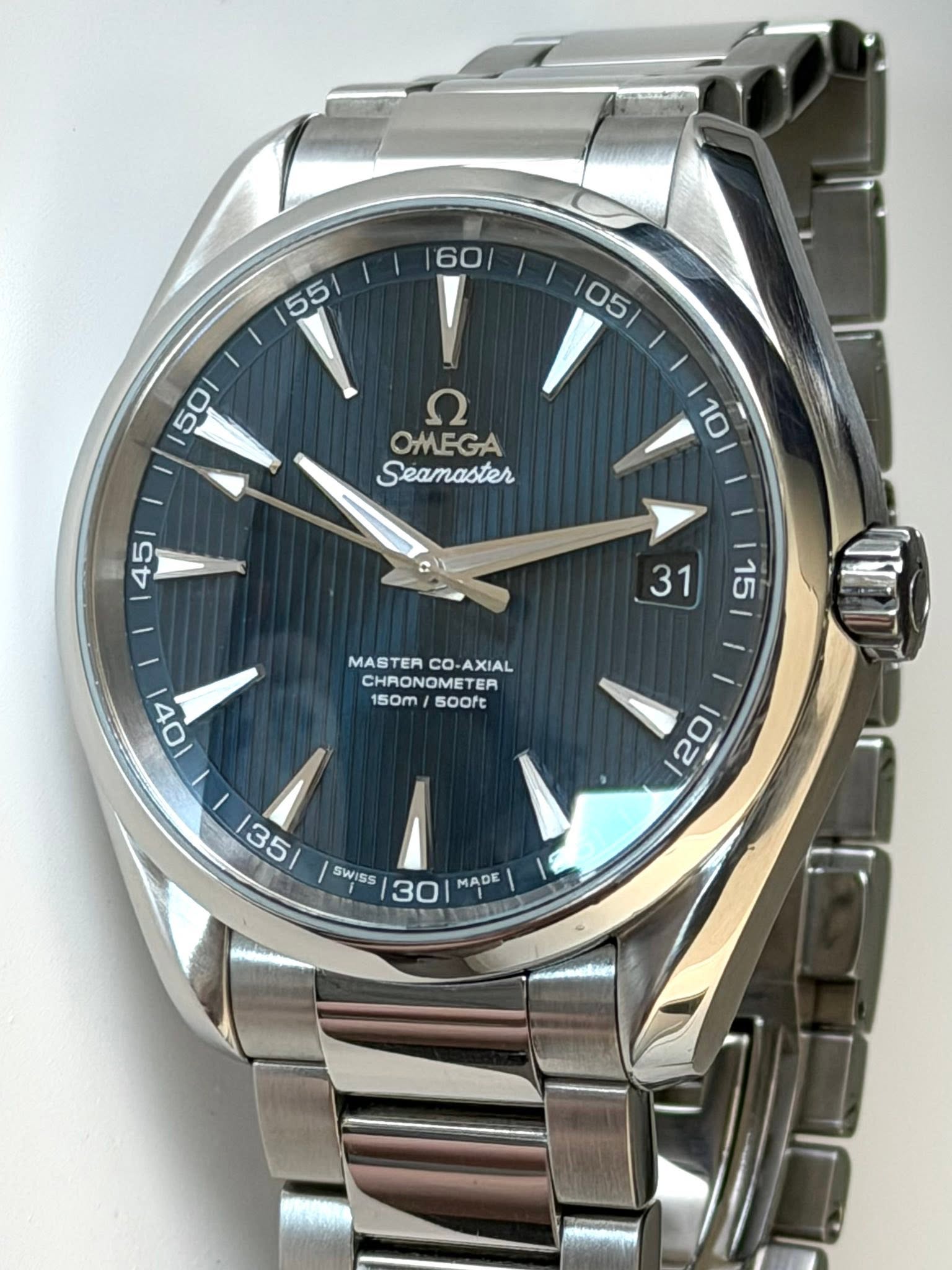 May be an image of wrist watch and text that says '60 155/ ע OMEGA Seamaster MASTER MASTERCO-AXIAL CO- AXIAL CHRONOMETE ER 150m 50m/500ft 50oft SWISS 30 MADE'