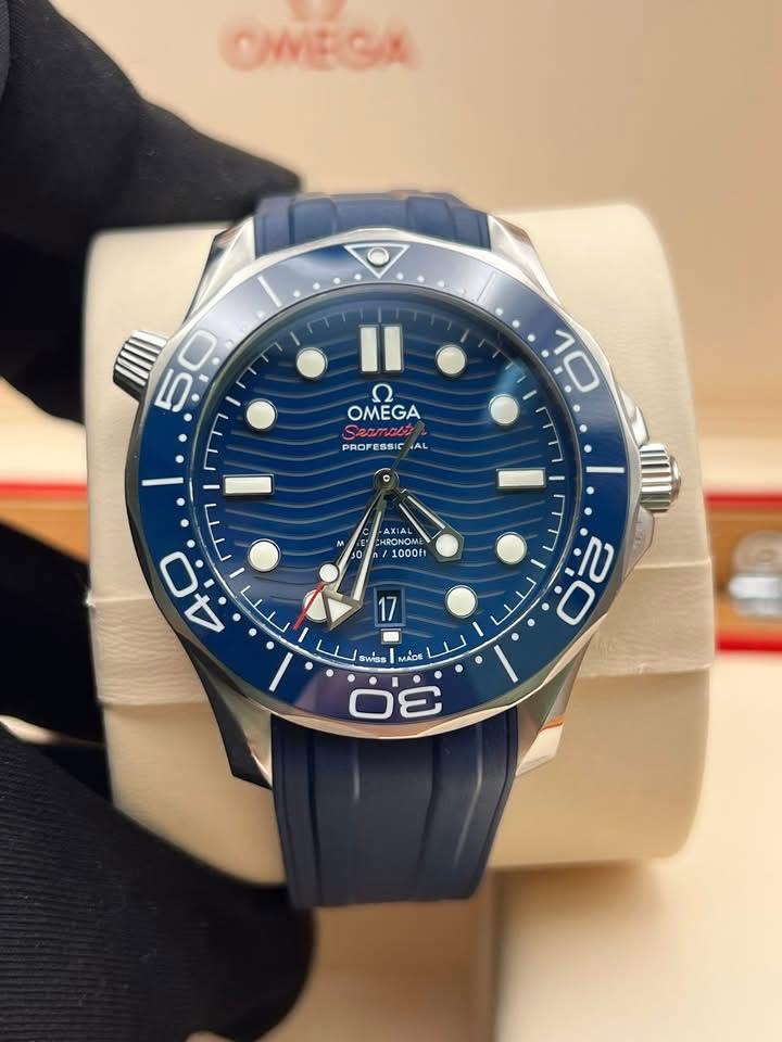 May be an image of wrist watch and text that says 'OWEGA 50 ח OMEGA amaba PROFESSIC PROF SSI AL 10 1AL สมด O 1000ft ب ل ب 4 rTT 20 ۰ รพคลล MADE 3'