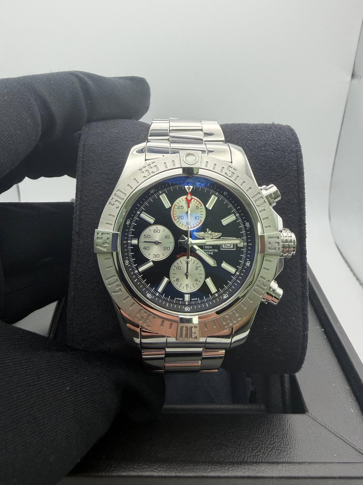 May be an image of wrist watch and text