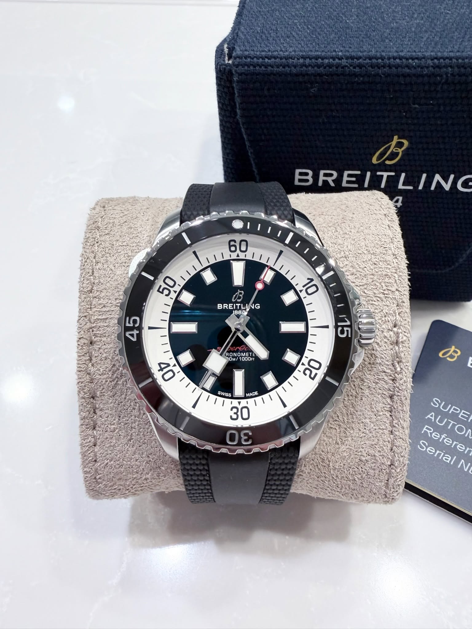 May be an image of wrist watch and text