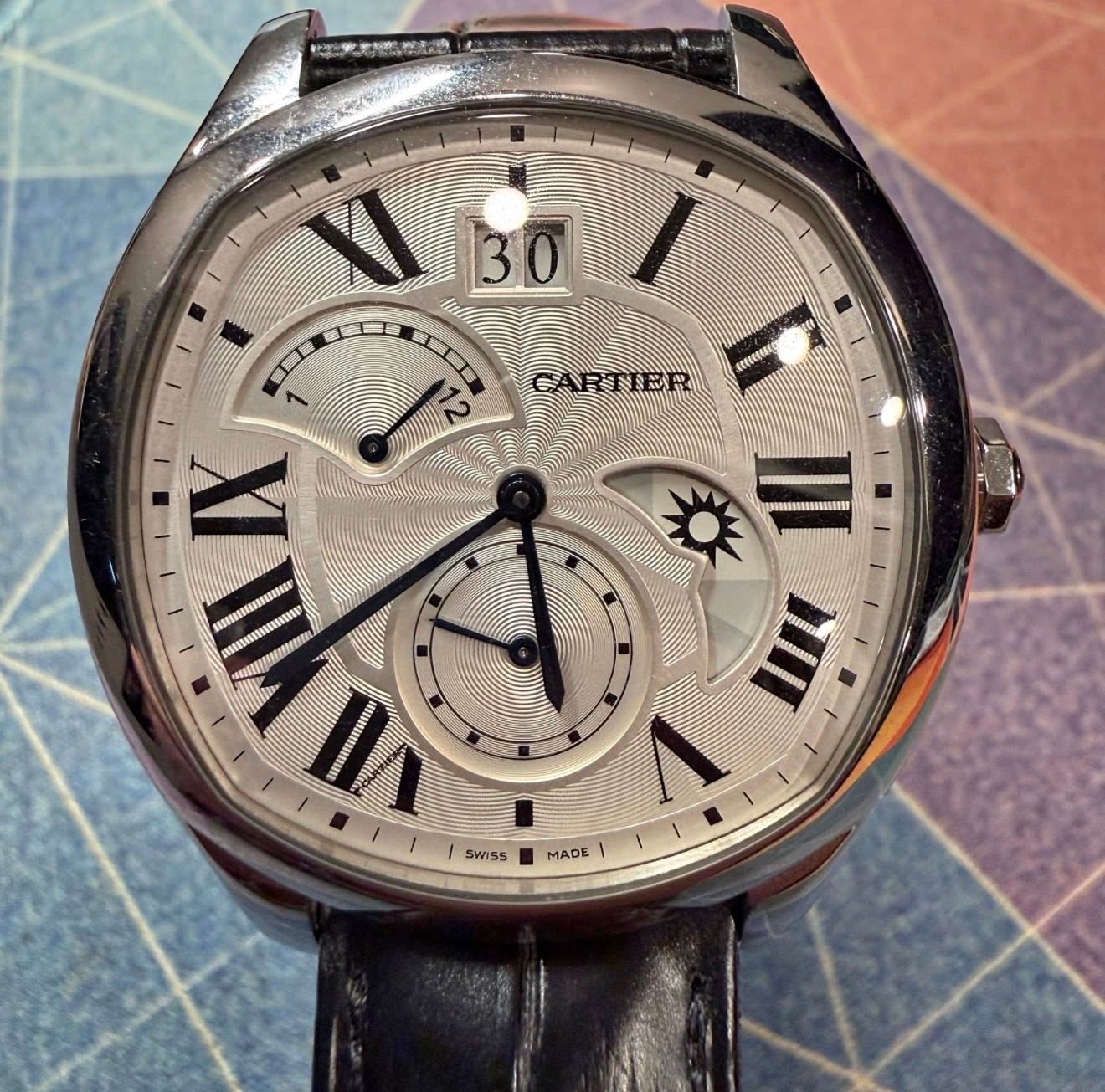 May be an image of wrist watch and text