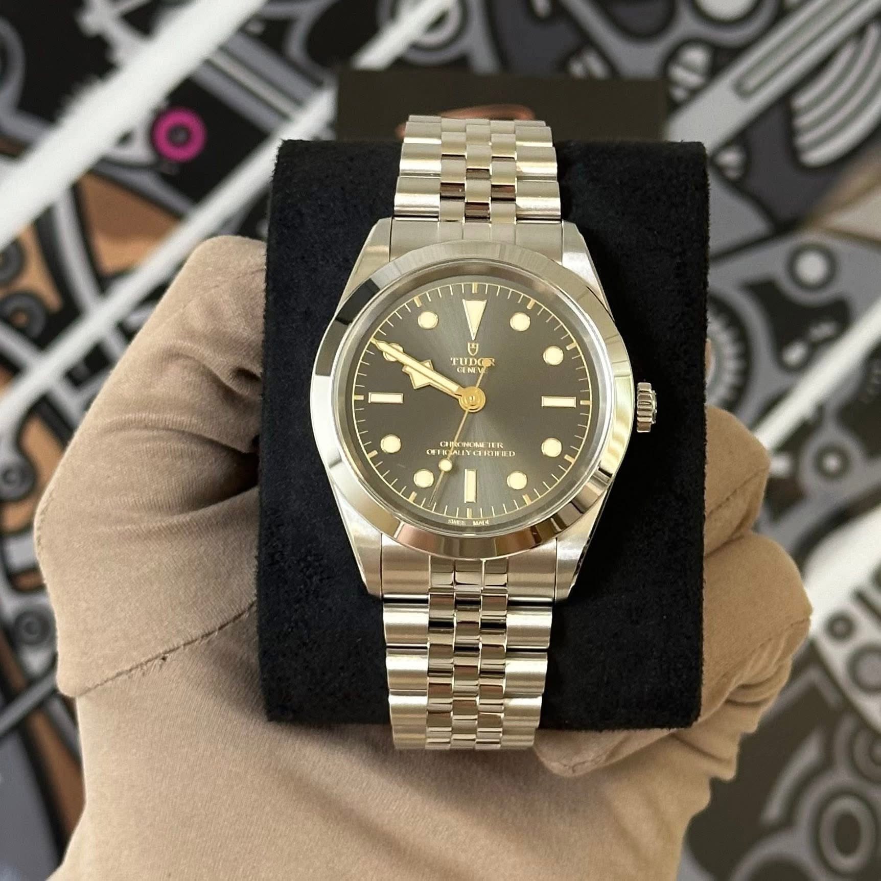 May be an image of wrist watch and text