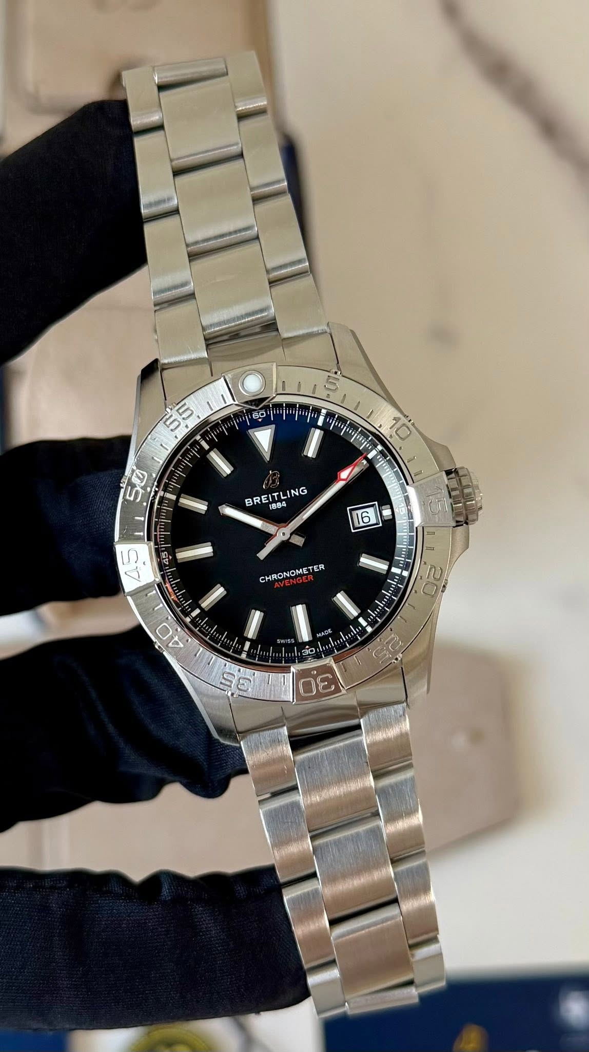 May be an image of wrist watch and text