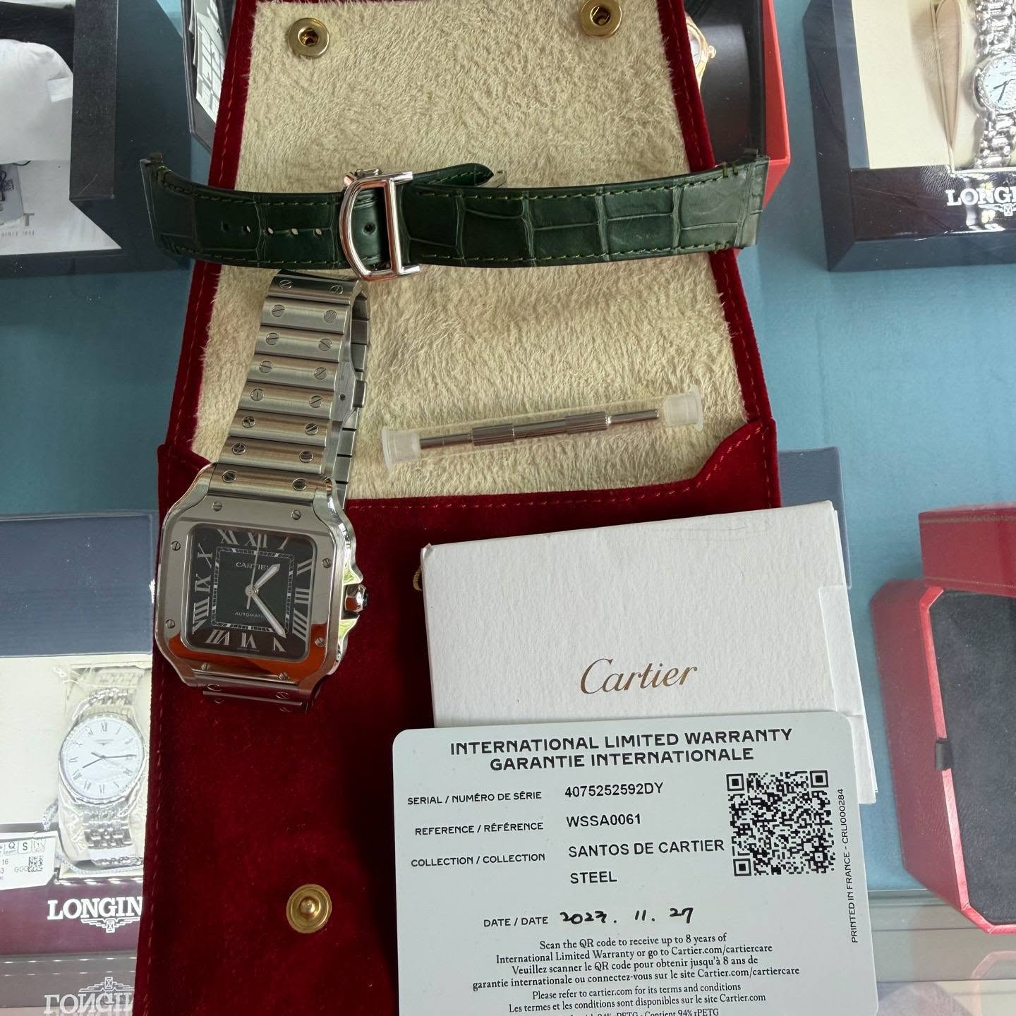 May be an image of wrist watch and text
