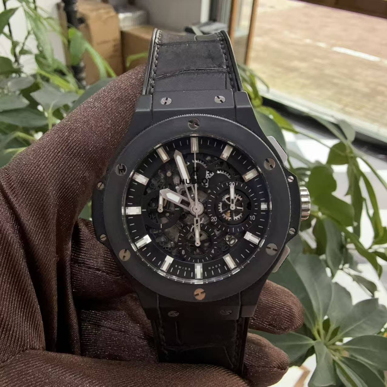 May be an image of wrist watch and text