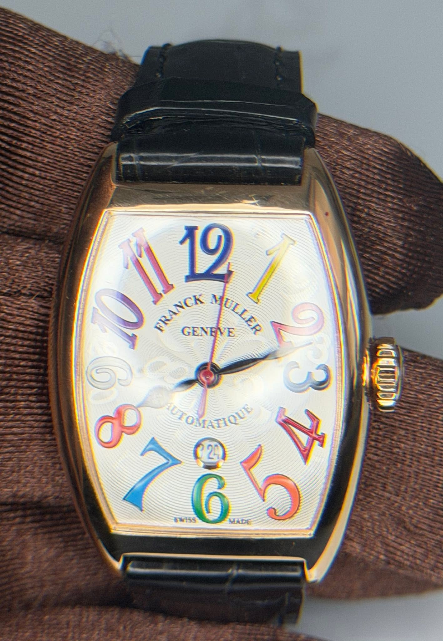 May be an image of wrist watch and text that says ' FRANCK BRANCK GENEVE YOLEP MULLER 121 I ១ IUTOMTATIQUE 7สว QUE 23 ص 24 MADE'