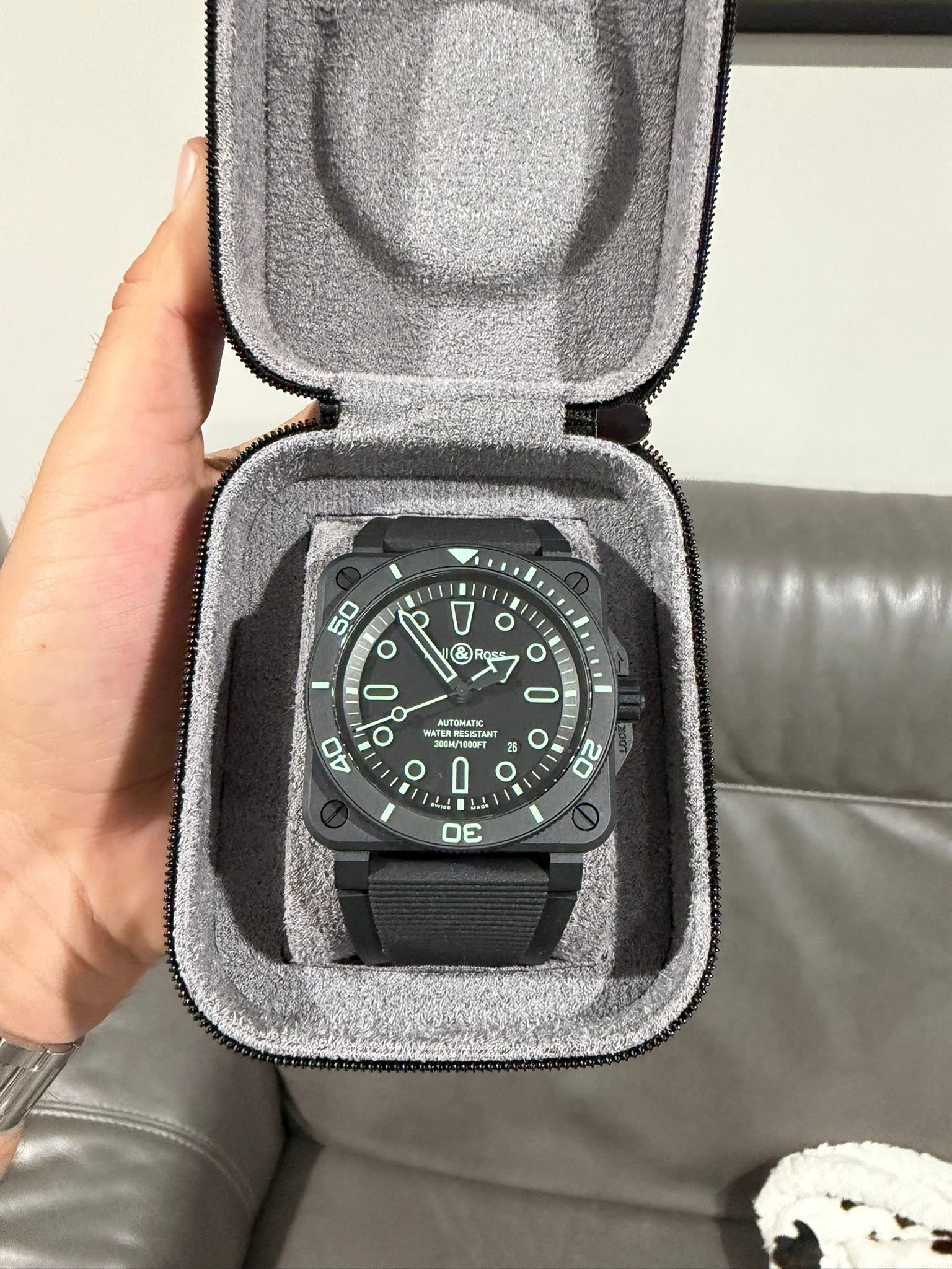 May be an image of digital watch and text