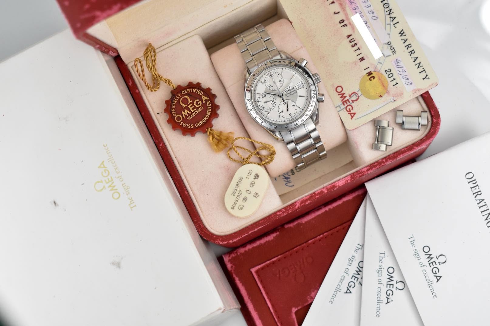 May be an image of wrist watch and text that says '5 金 dh נם 300 ONAL AUSTIN DATE: 2011 $/19/00 WARRANTY OMEGA OMEGA ALLY CERTIFIED 4ETE WISS MEG WATCHES CHRONOWE CHRON 2 SiGA…