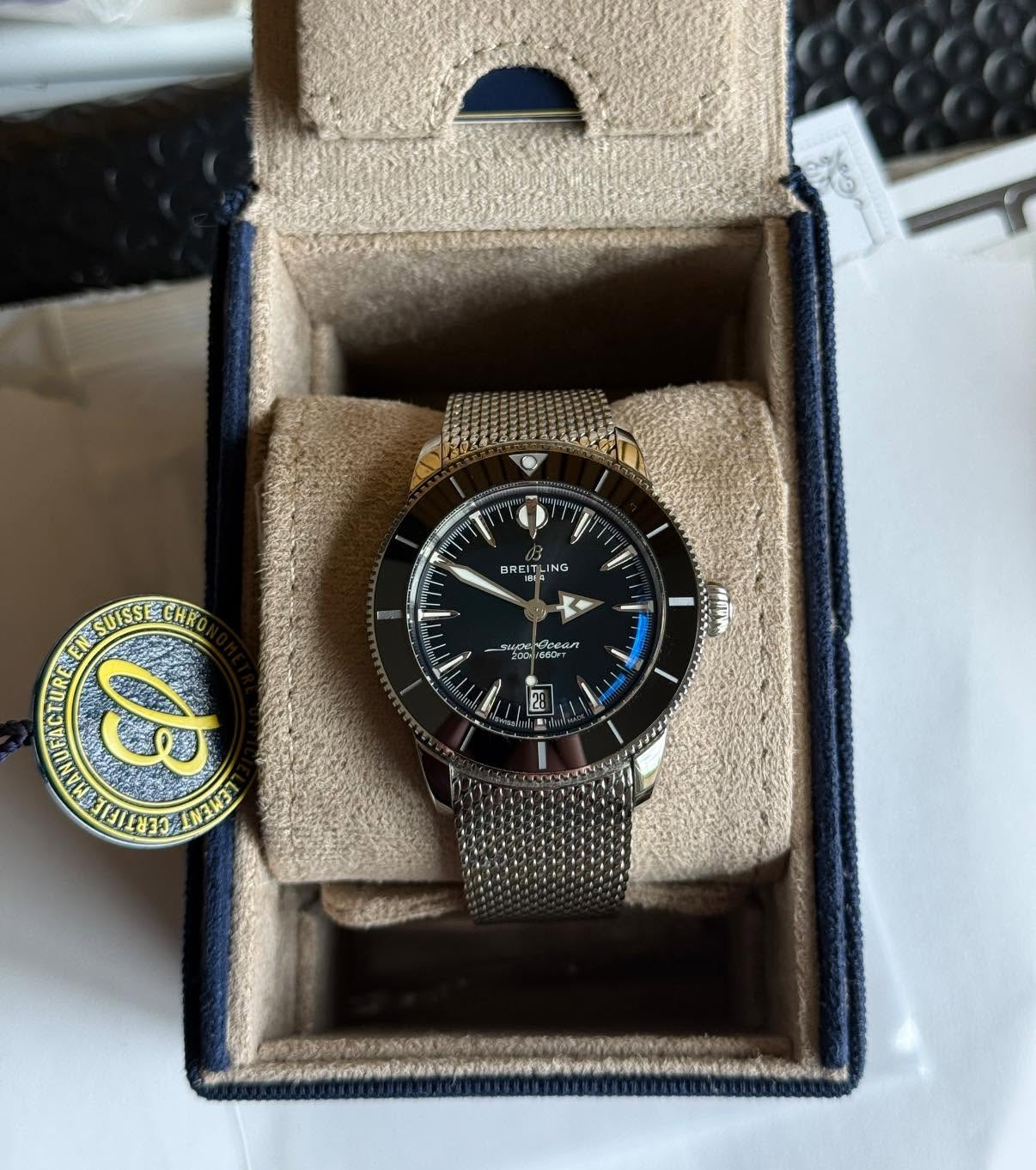 May be an image of wrist watch and text