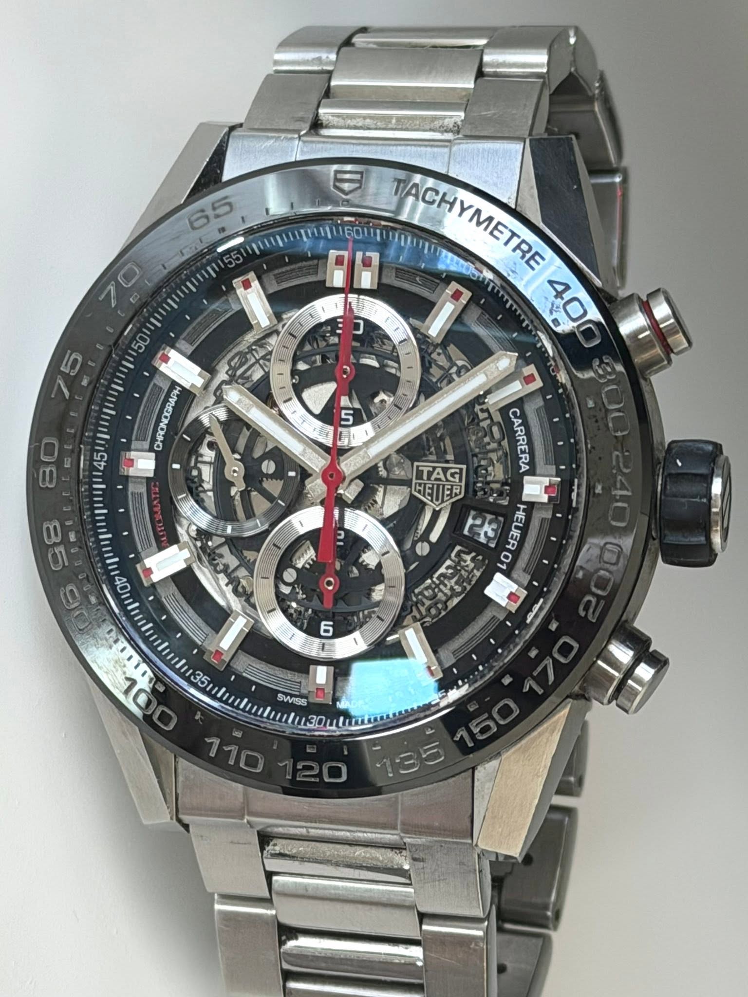 May be an image of wrist watch and text