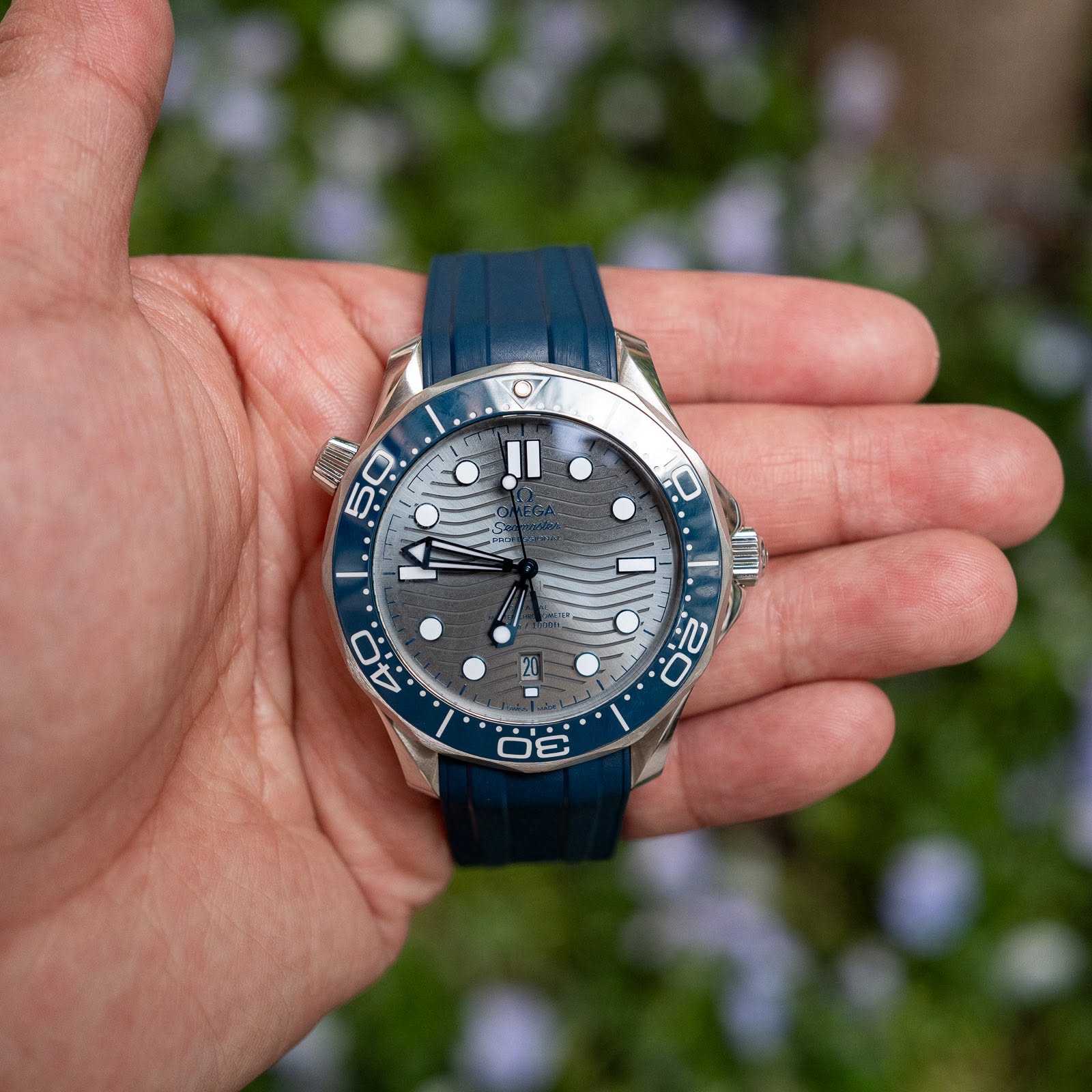 May be an image of wrist watch and text