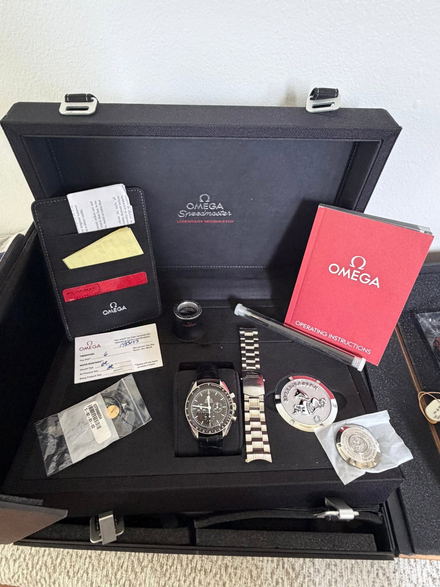 May be an image of wrist watch and text