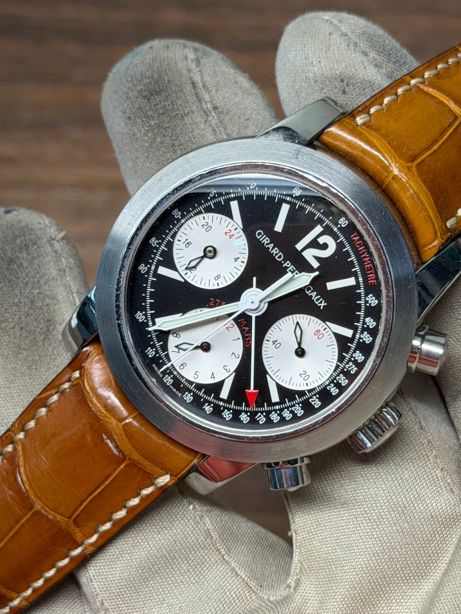 May be an image of wrist watch and text