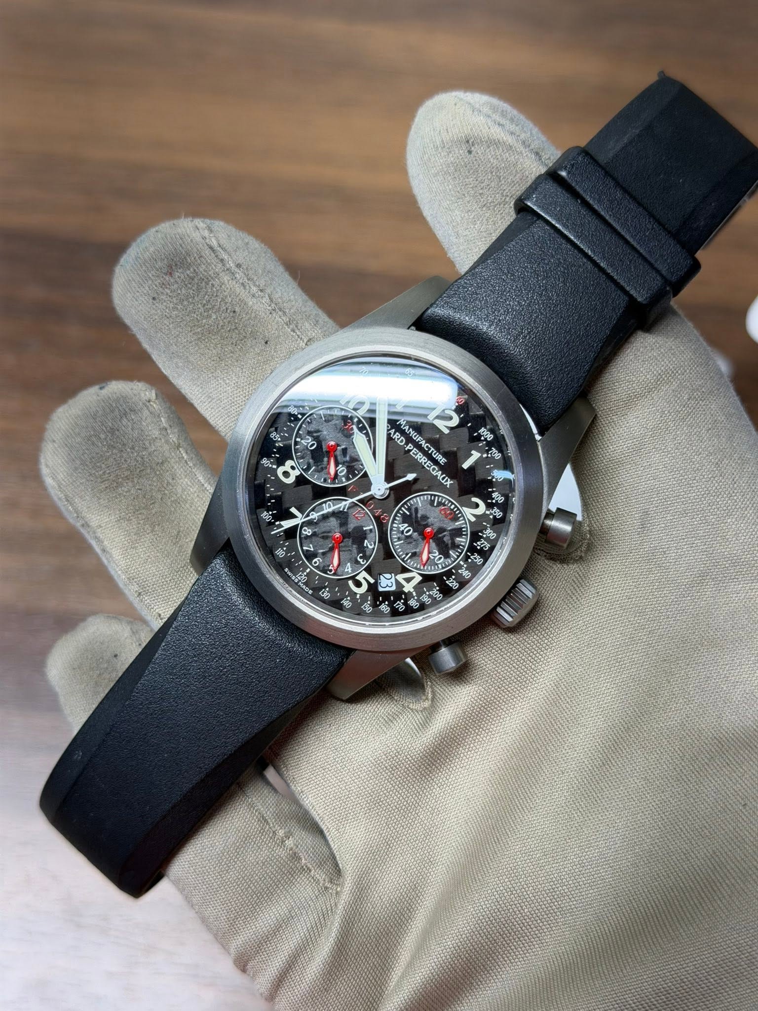May be an image of wrist watch and text