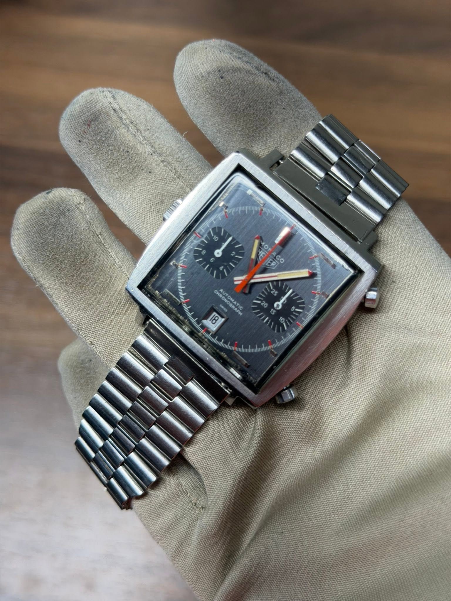 May be an image of wrist watch and text