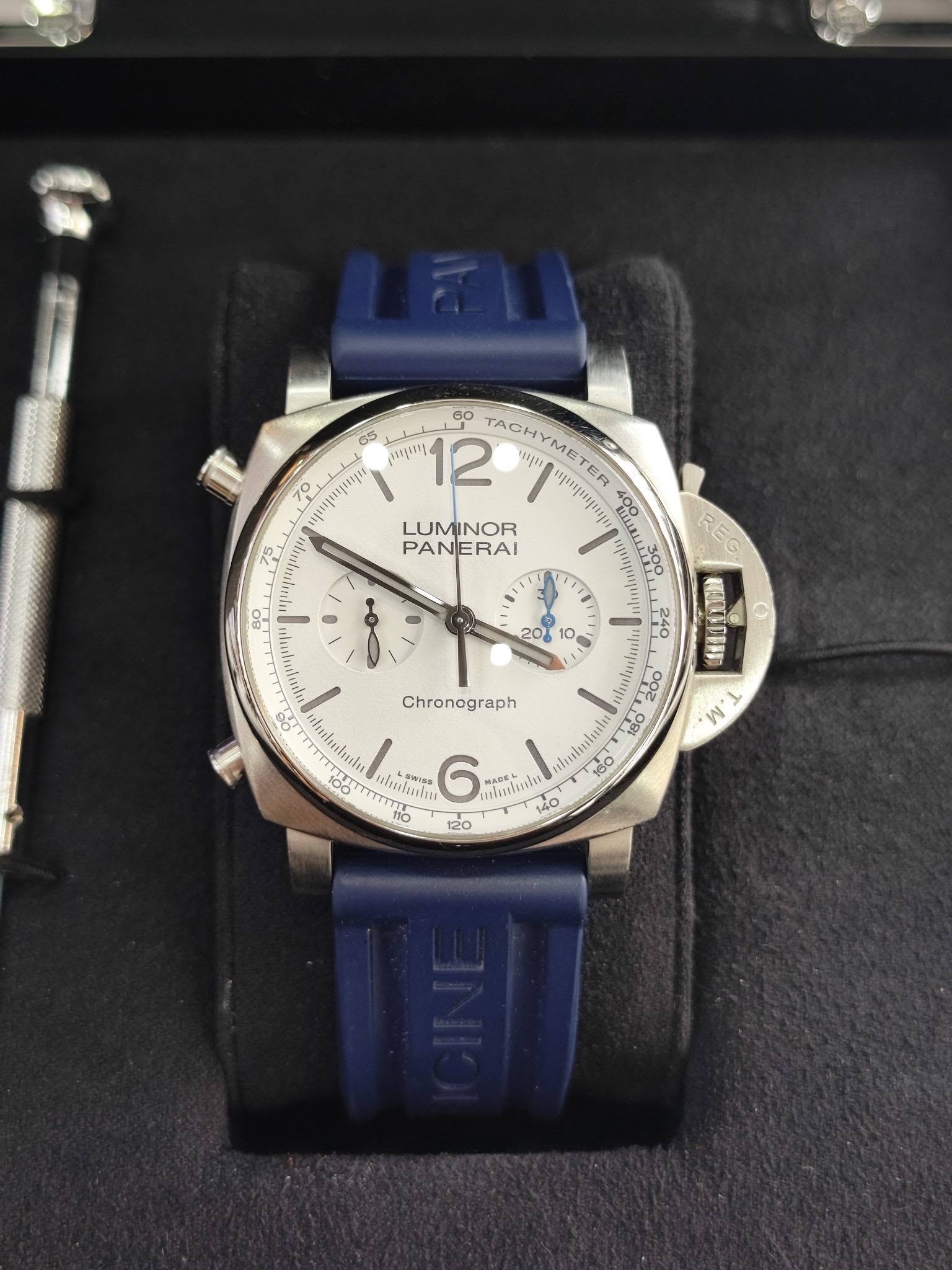 May be an image of wrist watch and text