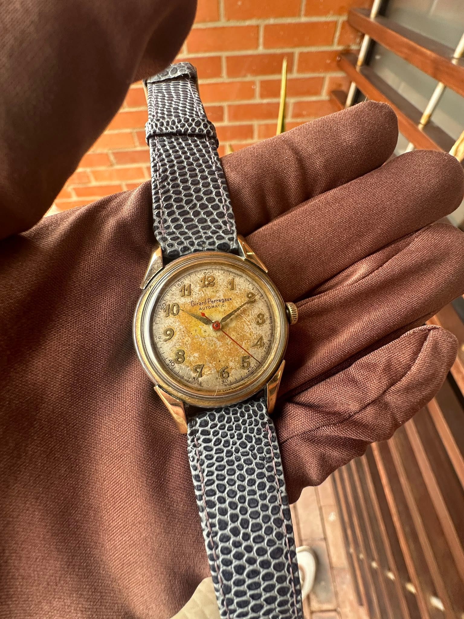 May be an image of wrist watch