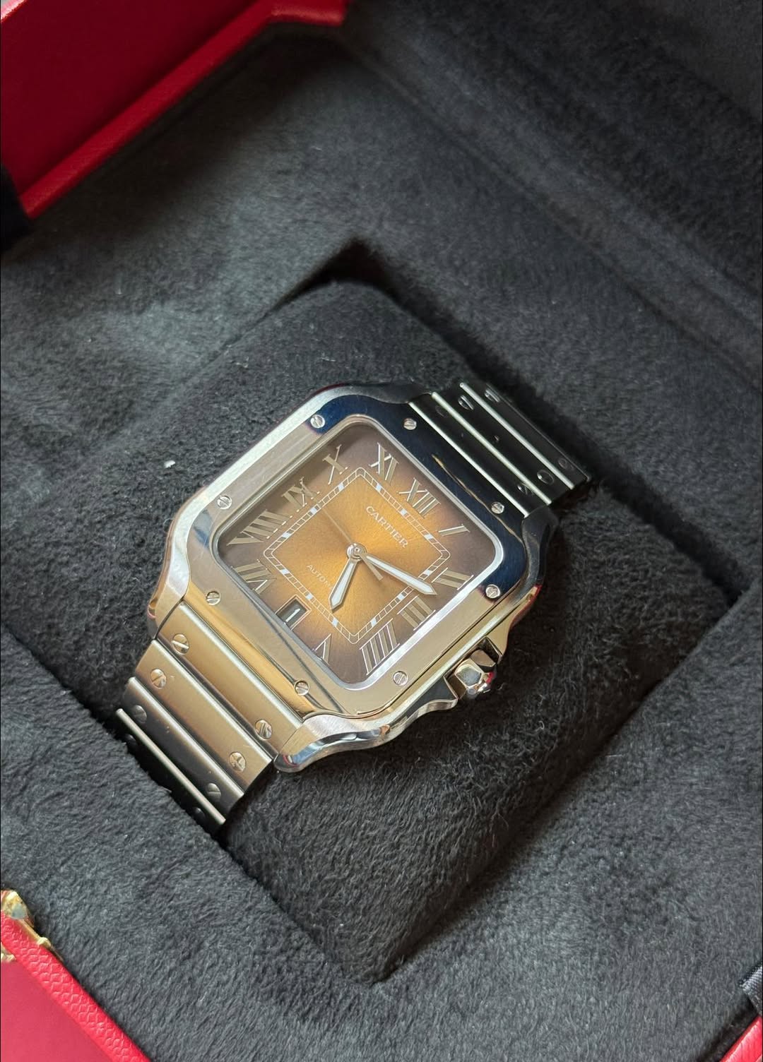 May be an image of digital watch and text that says '® X 3 NUUK TEDC 0 IN TXA XIII CARTIER XXXII/ TC S 19 VIL I ቤ III'