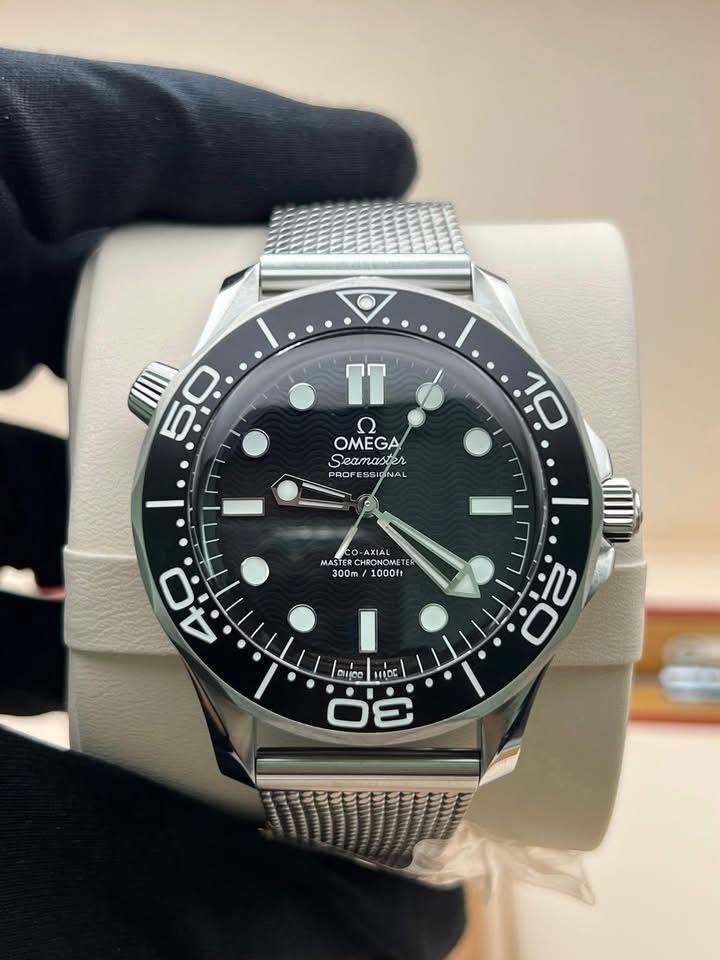 May be an image of wrist watch and text that says '50 D و OMEGA PAO PROFE PROFESSIONAL PROFESSIGINAL NAL 10 -AXIA MASTE HICNONE HRONON 300m 1000ft 0 ب4 ن 20 2 小 C ส ン 10OC ó 30…
