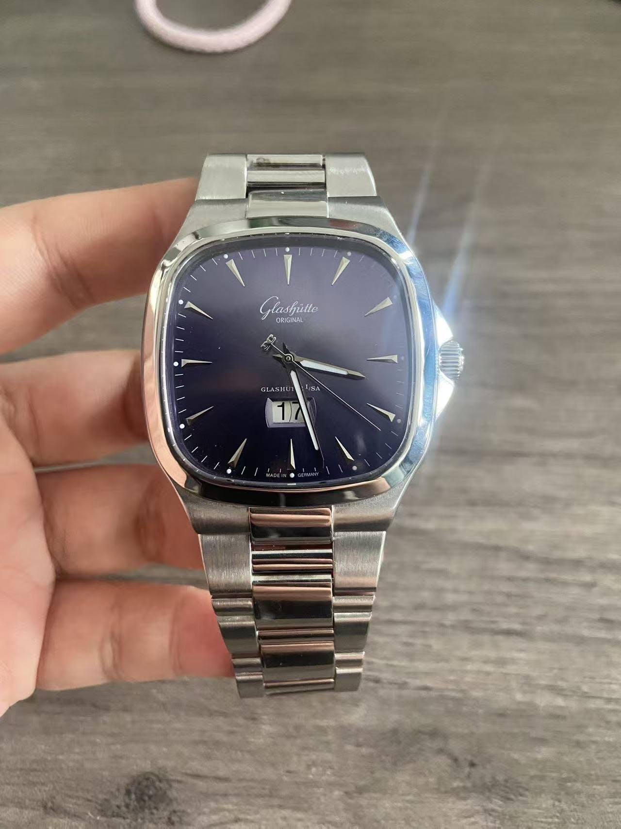 May be an image of digital watch and text