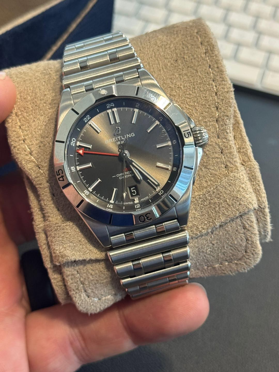 May be an image of wrist watch and text