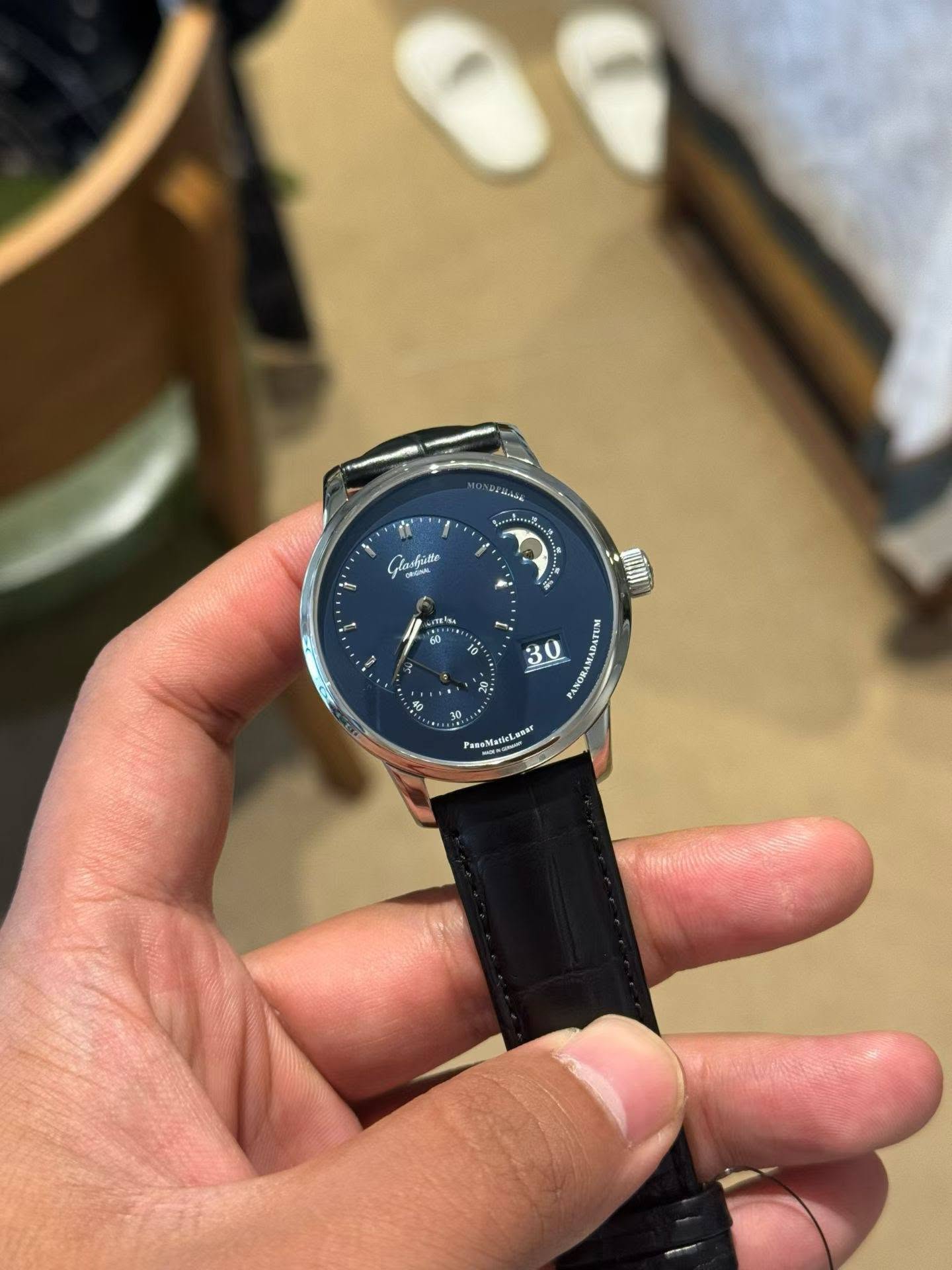 May be an image of wrist watch and text