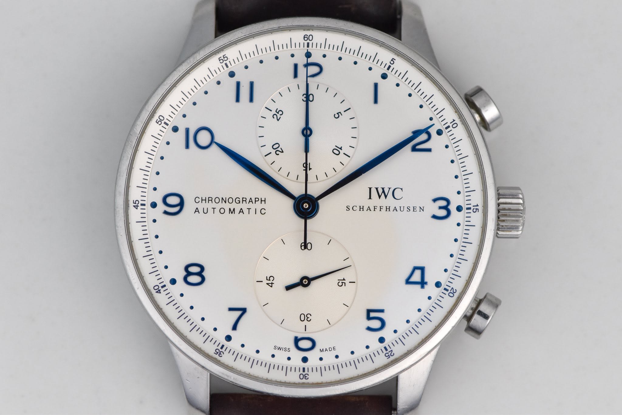 May be an image of wrist watch and text that says '60 55 I1 5 50 לו 30 25 ی 10 22 d AUTOMATIC CHRONOGRAPH IWC SCHAFFHAUSEN σε 7 ら ကင့် SWISS MADE 20 LD 5 S2 25 σε'