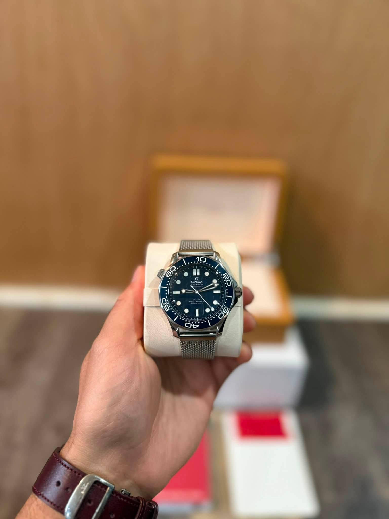 May be an image of wrist watch and text