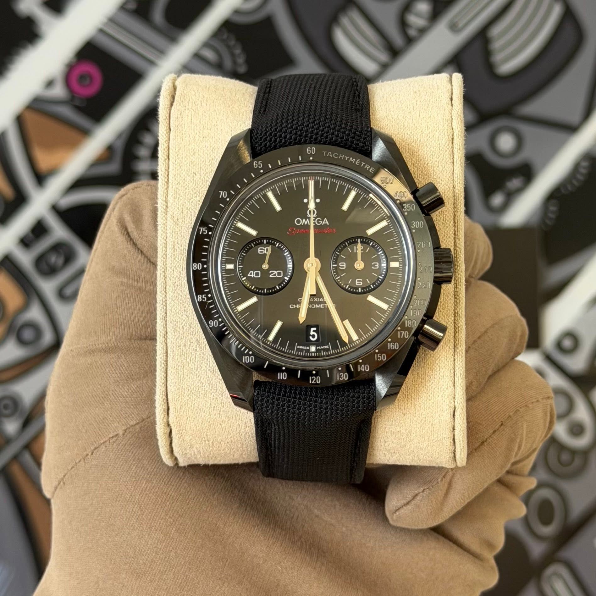 May be an image of wrist watch and text that says '65 T1 CHYMET γΜέ TRE อ SU0 5 OM GA : 40 20 E 9 3 3 P S5 90 CH KI ی 100 TO '