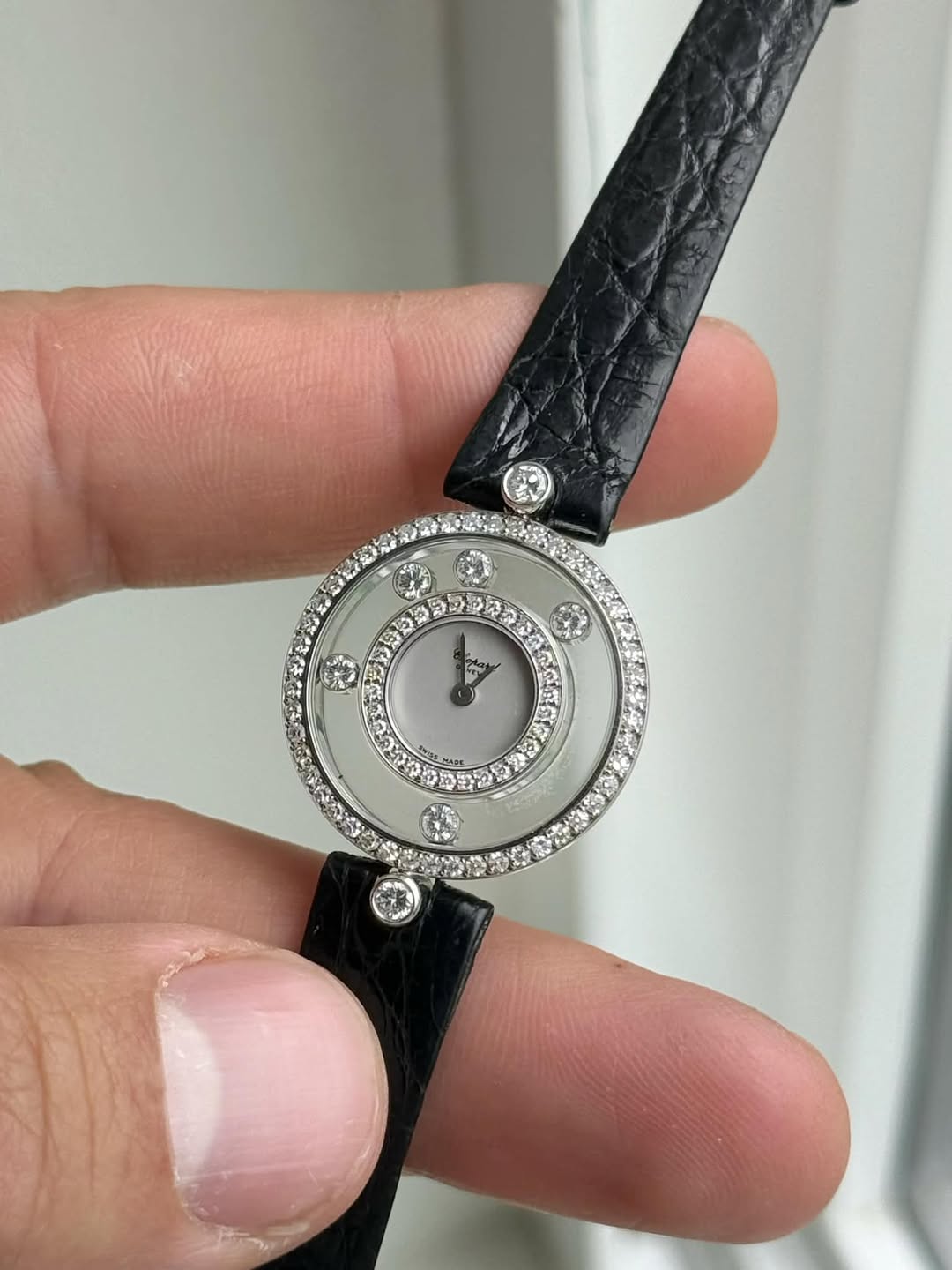 May be an image of jewelry, cufflinks and wrist watch