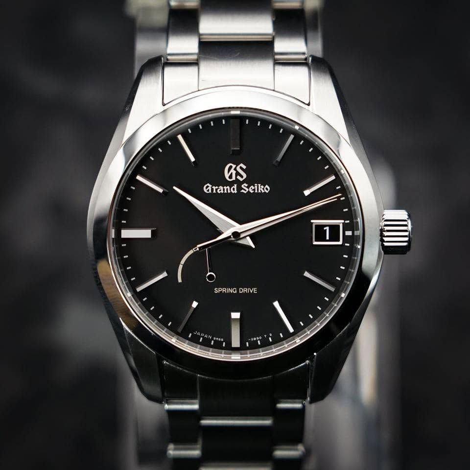 May be an image of wrist watch and text that says 'GS Grand GrandSeiko Seiko 1 SPRING DRIVE'